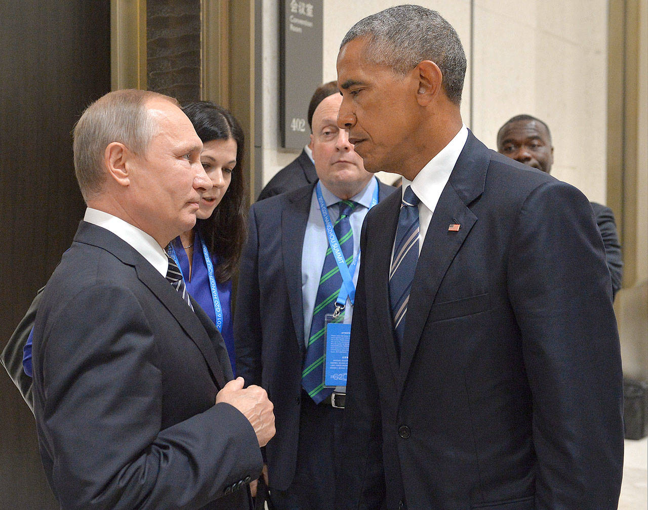 On Sept. 5, 2016, at a meeting of world leaders in Hangzhou, China, U.S. President Barack Obama (right) met with Russian President Vladimir Putin. At one point, accompanied only by interpreters, Obama told Putin that “we knew what he was doing and [he] better stop or else,” according to a senior aide who subsequently spoke with Obama. (Alexei Druzhinin/Sputnik, Kremlin Pool Photo via AP, File)