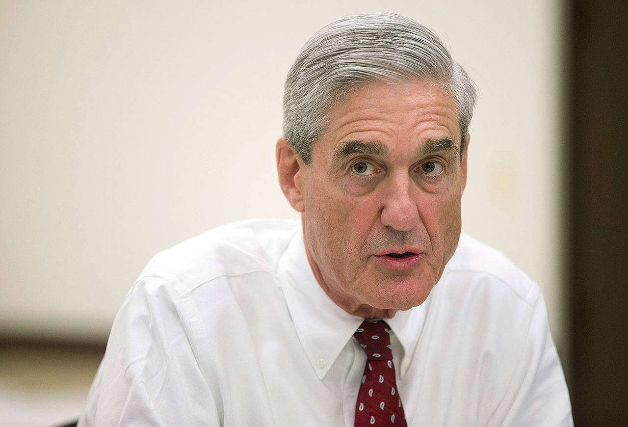 Robert Mueller speaks during an interview at FBI headquarters in Washington in 2015. (AP Photo/Evan Vucci, File)