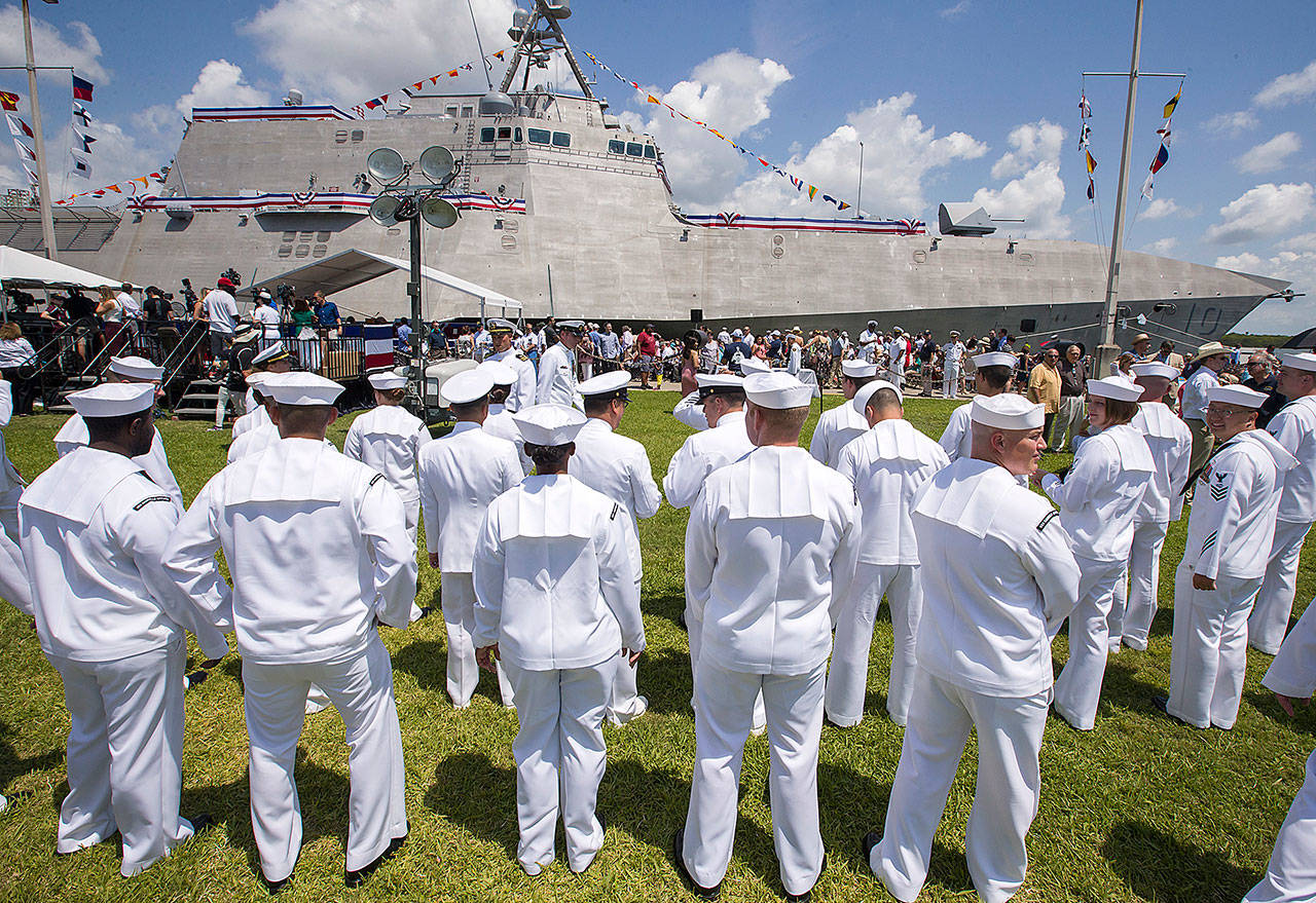 Sailors wait before a commissioning ceremony for the USS Gabrielle Giffords in Galveston, Texas, on Saturday. (Stuart Villanueva / The Galveston County Daily News)