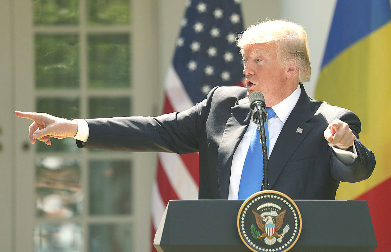 President Donald Trump speaks during a news conference in the Rose Garden at the White House on Friday in Washington. (AP Photo/Andrew Harnik)