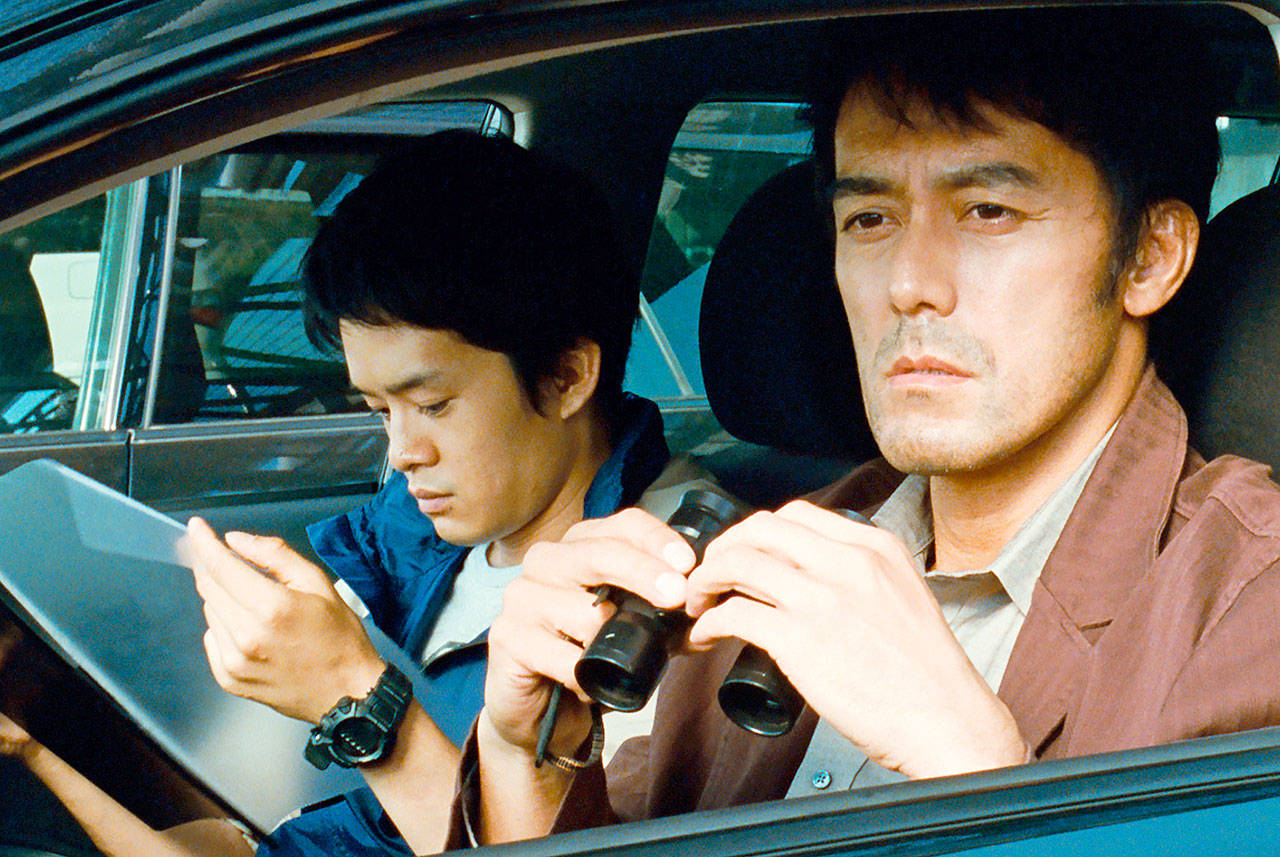 Hiroshi Abe (right) plays a down-on-his-luck writer now working for a detective agency in Hirokazu Kore-eda’s “After the Storm.” (Film Movement)
