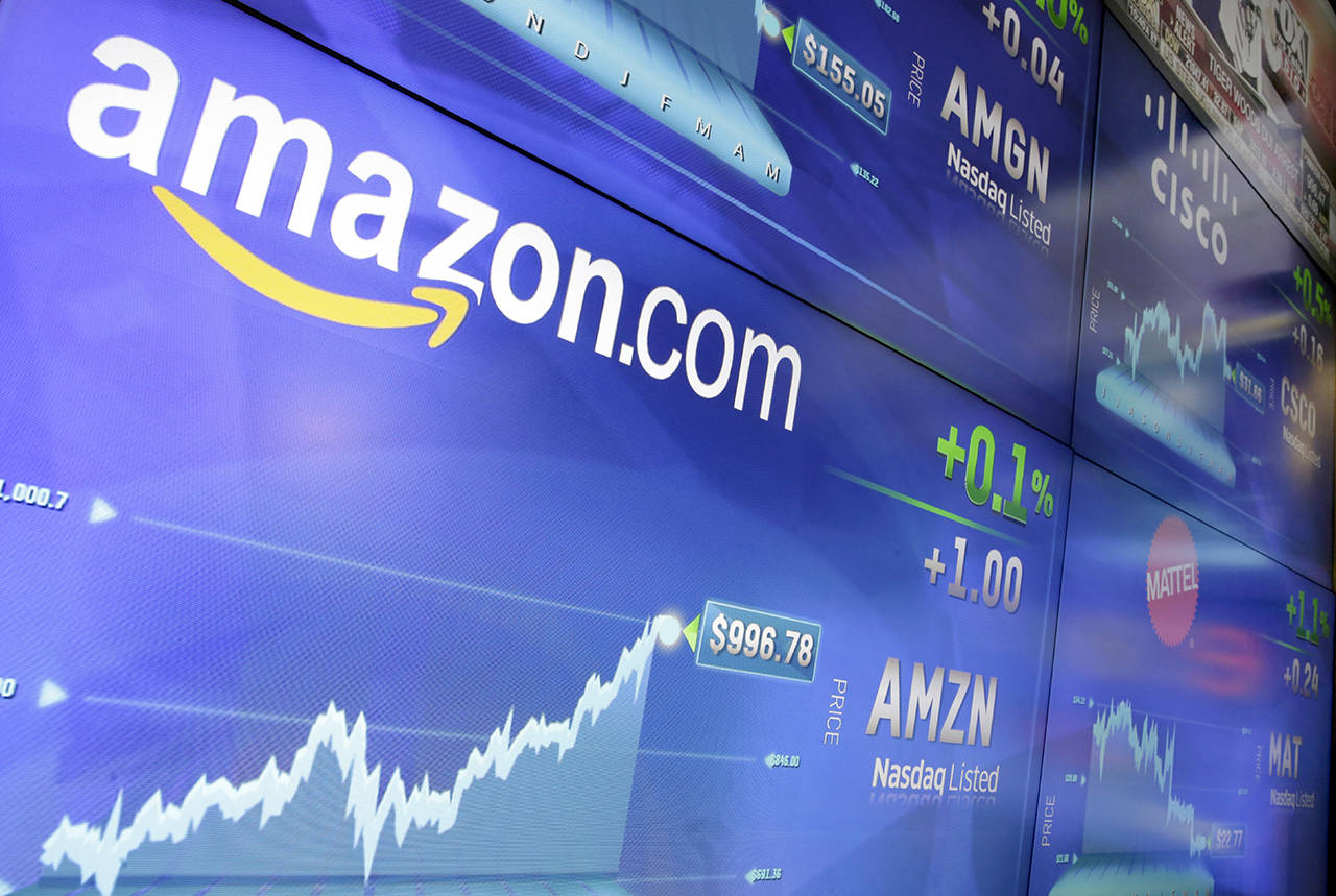 In this May 30, 2017 photo, the Amazon logo is displayed at the Nasdaq MarketSite, in New York’s Times Square. (AP Photo/Richard Drew, File)
