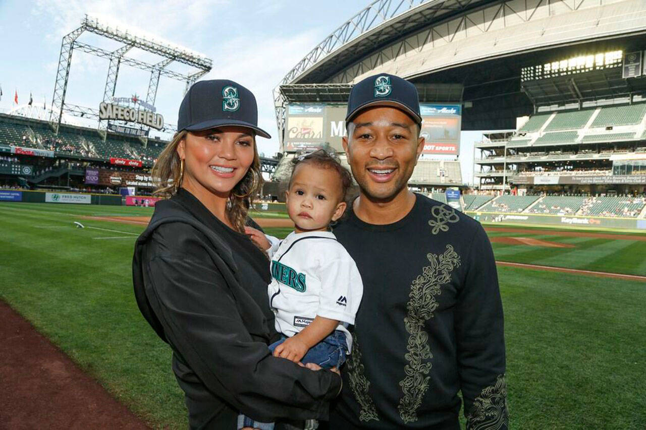 Chrissy Teigen and John Legend and their baby visit Safeco Field. (Seattle Mariners)