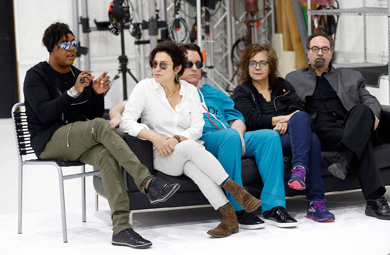 Bassist BrownMark (left) answers a question as the original members of Prince’s 1980s band, The Revolution, (from second left) guitarist Wendy Melvoin, keyboardists Matt Fink and Lisa Coleman and drummer Bobby Z, look on during an interview April 19, 2017, in Minneapolis. (Associated Press)