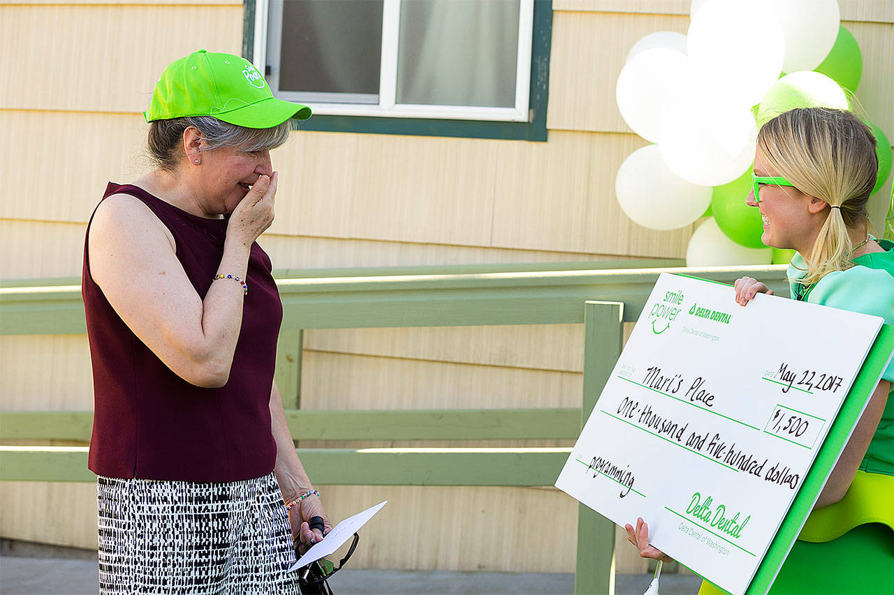 The Delta Dental of Washington Smile Power team visited Mari’s Place in Everett to honor Mary Toews as a Smile Maker and make a $1,500 contribution to her organization. (Contributed photo)