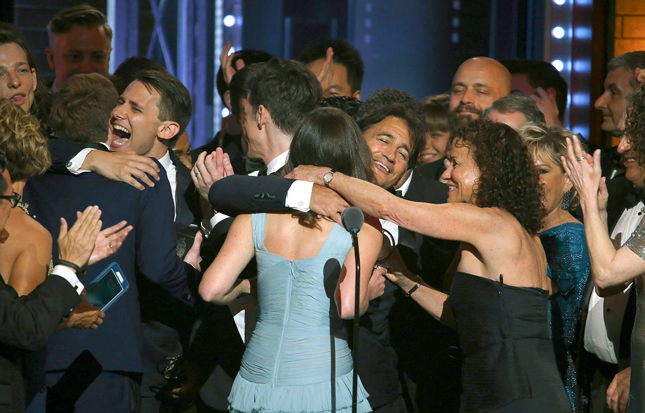 The cast and crew of “Dear Evan Hansen” celebrate winning the award for best musical at the 71st annual Tony Awards on Sunday in New York. (Photo by Michael Zorn/Invision/AP)