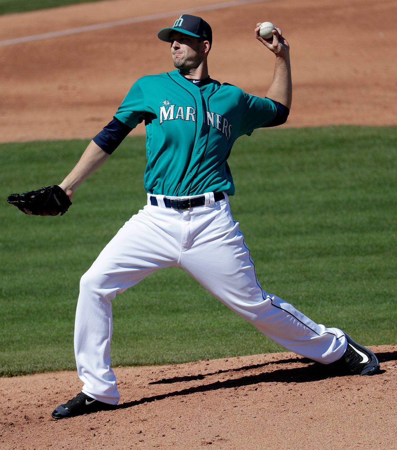 Seattle Mariners pitcher Drew Smyly throws against the Texas Rangers a Cactus League game in March in Peoria, Arizona. (AP Photo/Matt York)