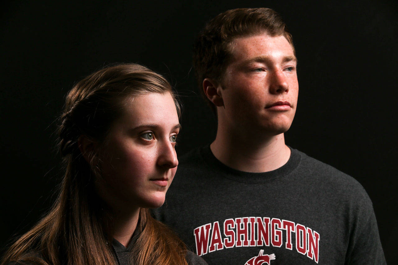 Arianna Calvin, Kamiak High School (left) and Sultan High School’s Tholen Blasko, will attend Washington State University as Regents Scholars with full-ride scholarships. (Kevin Clark / The Herald)
