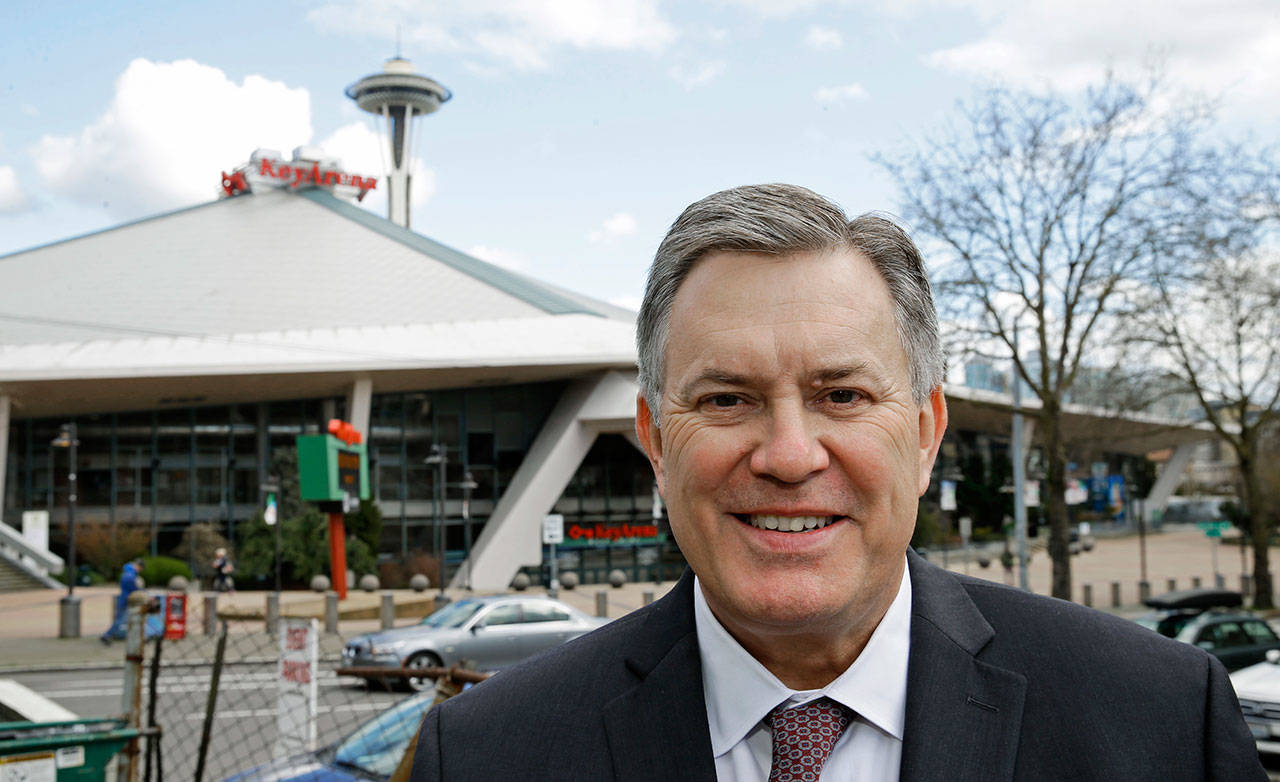 In this March 16, 2017 photo, Tim Leiweke, head of the Oak View Group, poses for a photo in front of KeyArena in Seattle. (AP Photo/Ted S. Warren)
