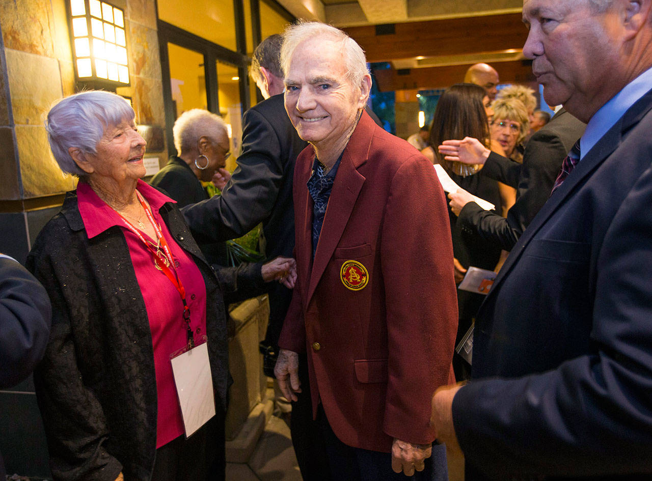 In this photo from April 8, 2015, former Arizona State University football coach Frank Kush waits to be introduced at the Arizona Sports Hall of Fame induction ceremony in Scottsdale, Arizona. Kush, the coach who transformed Arizona State from a backwater football program into a powerhouse, has died, ASU confirmed. He was 88. (Michael Chow/The Arizona Republic via AP, File)