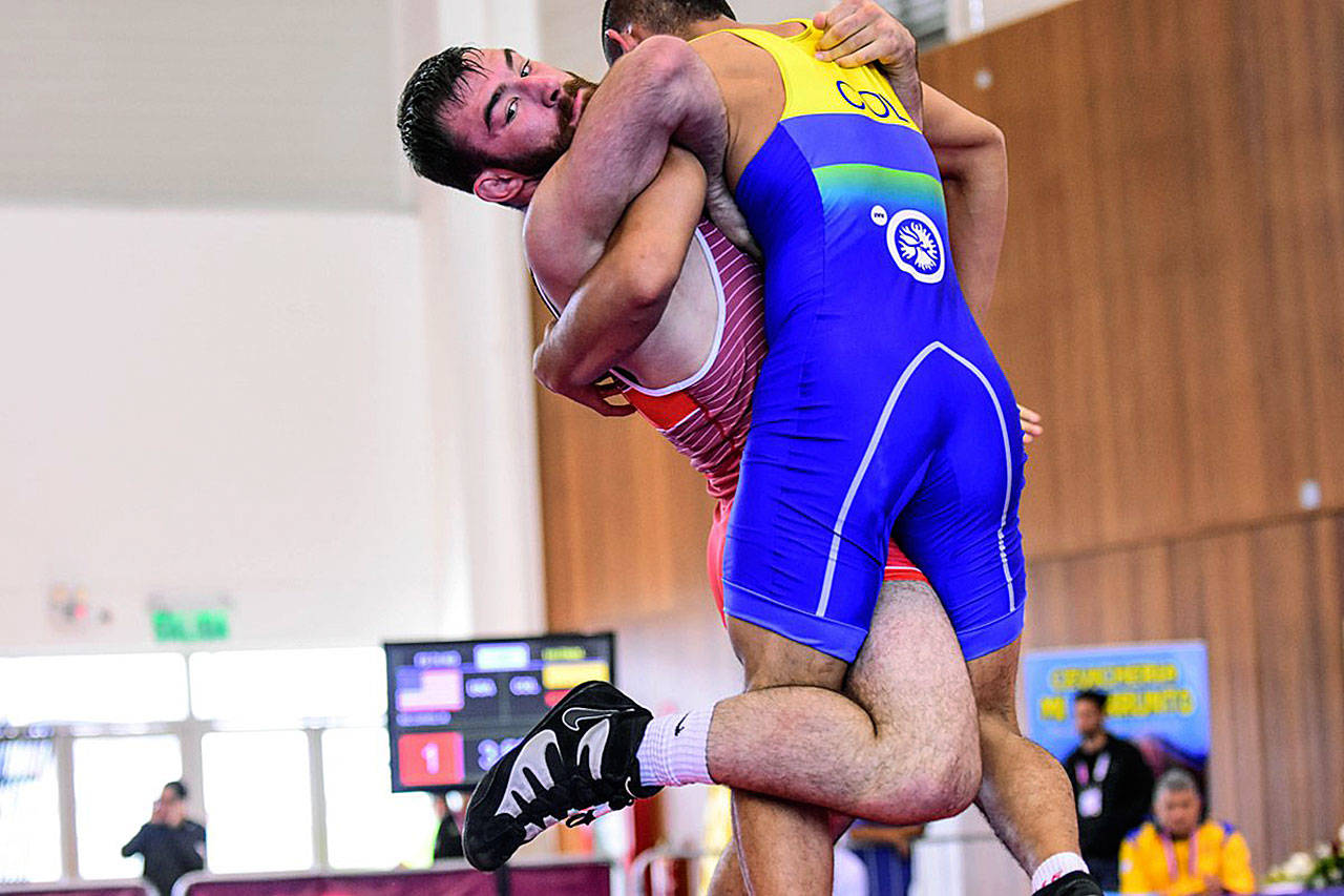 Photo courtesy of USA Wrestling                                Mason McDaniel (left), a graduate of Edmonds-Woodway High School, competes in the Junior Pan American Games earlier this month in Lima, Peru.