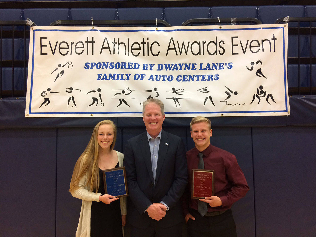 Provided photo                                Marlena Urvater (left) and Jacob Elenbaas (right) pose with their awards at the Dwayne Lane Athlete of the Year Awards Banquet on Thursday at Everett High School.