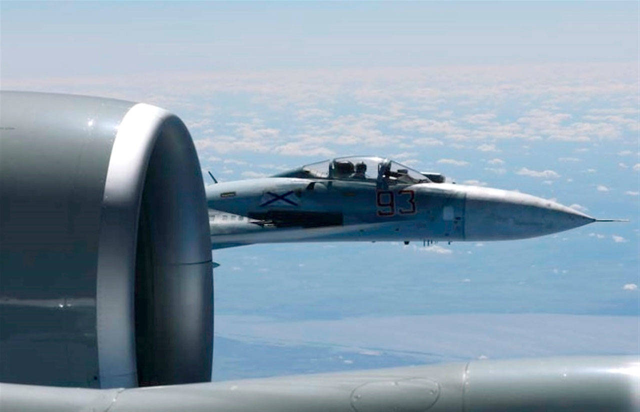 This is a photo of a Russian jet coming within a few feet of a U.S. Air Force reconnaissance jet over the Baltic Sea on June 19 in a maneuver that has been criticized as unsafe. (Master Sgt Charles Larkin Snr/U.S. European Command via AP)