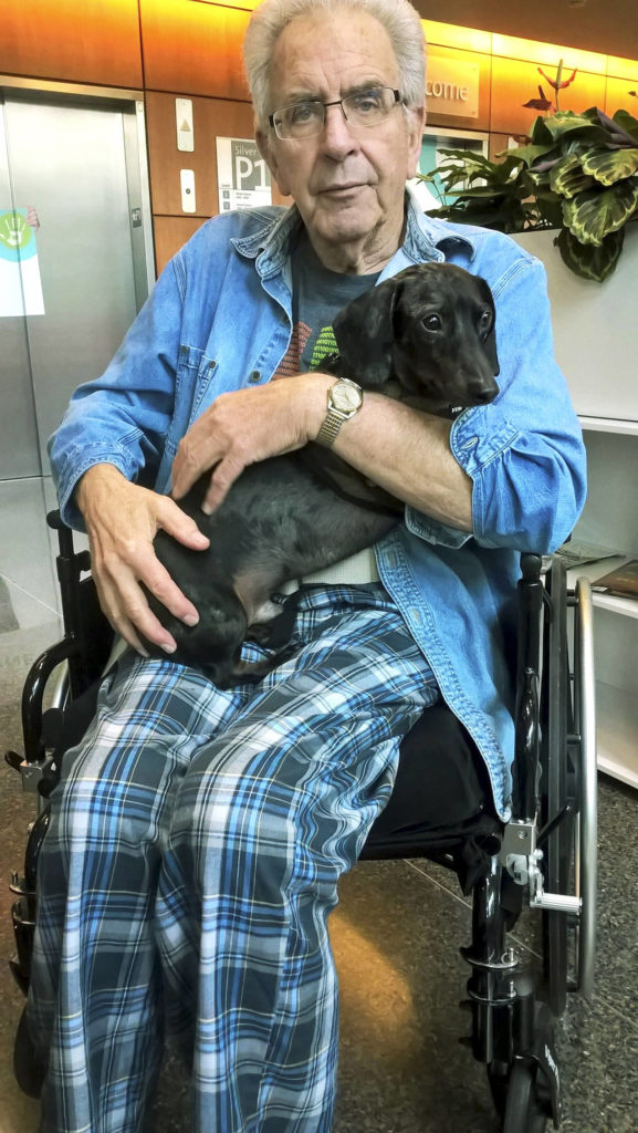Dale Reiner, 75, requested time with his dog, Cosmo, at the hospital while recovering from a heart attack he suffered in April. (Family photo)
