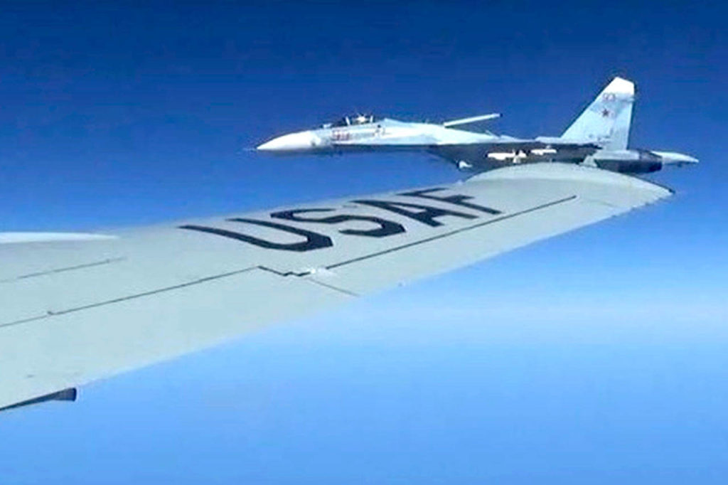 Photographs released Friday, June 23, show a Russian SU-27 coming so close to the wing of U.S. RC-135U on June 19 that the Russian pilot can be seen sitting in the cockpit in some images. (Master Sgt Charles Larkin Snr/U.S. European Command via AP)
