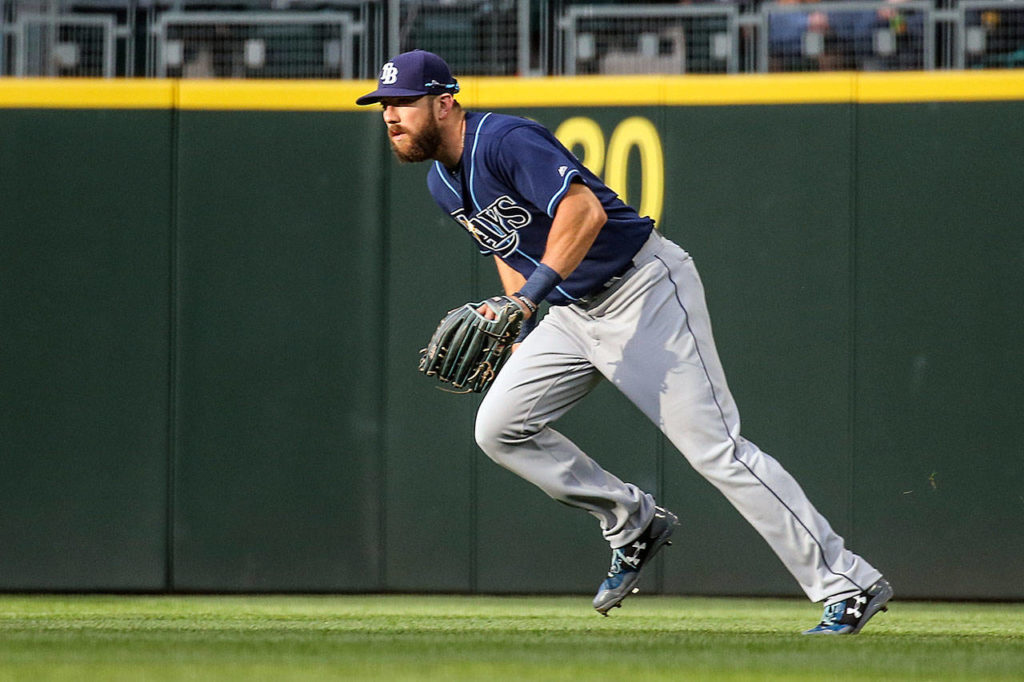 Rays outfielder Steven Souza Jr., a former standout at Cascade High School, chases a ground ball during his return to play the Mariners on June 3, 2017, at Safeco Field in Seattle. (Kevin Clark / The Herald)
