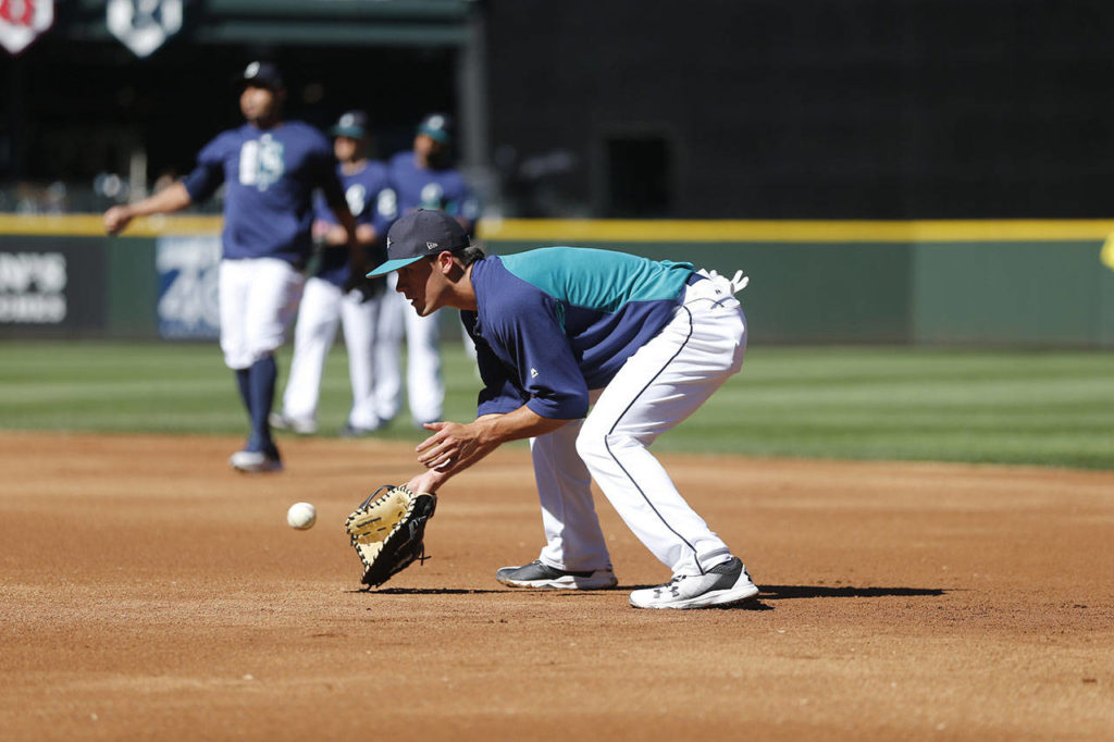 Mariners top draft pick Evan White takes ground balls at first base during batting practice at Safeco Field on June 23, 2017, in Seattle. (Ben VanHouten/Seattle Mariners).
