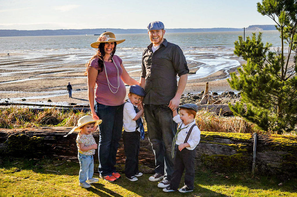 A recent family photo taken at a Snohomish County beachfront park shows Amy, Alex, and their children Seirsha, Willem and Atley. Amy is pregnant with Elayda in the photo. (Photo courtesy of Alex Clawson)
