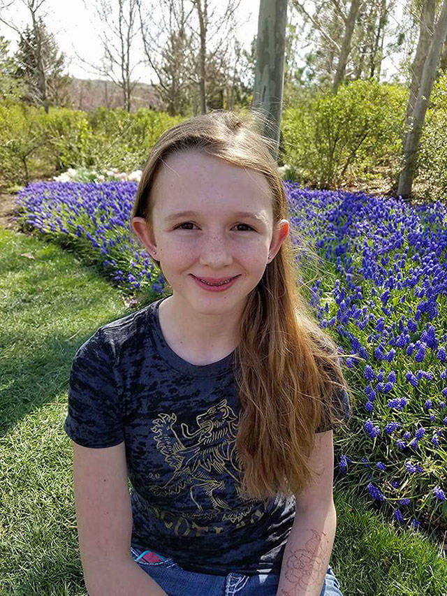 Savannah told her congregation during a Sunday service she is a lesbian before her microphone was turned off by local church leaders. (Family photo)