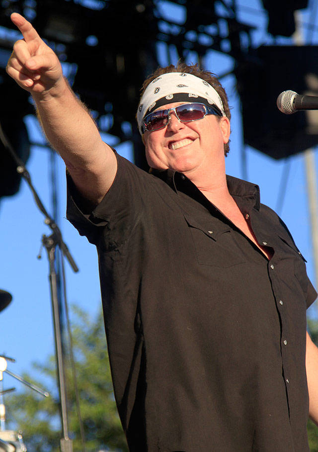 The rock group Loverboy, fronted by Mike Reno, and fellow 1980s band Survivor are set to perform Sept. 22 at Xfinity Arena in Everett. (Associated Press)