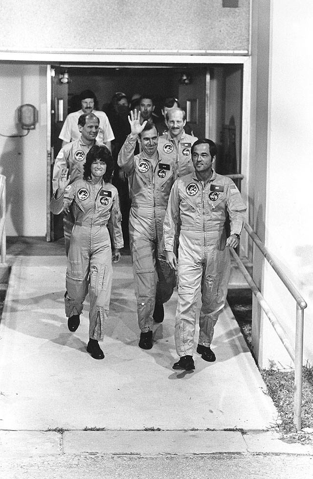 The crew of space shuttle Challenger, including first American woman in space Sally Ride, leaves for boarding at Kennedy Space Center in Florida on June 18, 1983. (Associated Press archive)