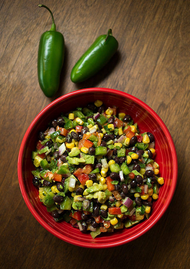 This chunky salsa contains black beans, corn, bell peppers, hot peppers, red onion, cilantro, lime juice and cumin. (Andy Bronson / The Herald)