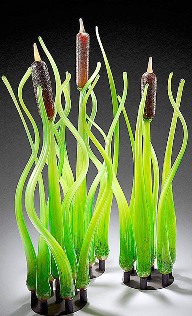 “Cattails,” a blown glass piece by Katie Matson, is displayed in the current Art of the Garden exhibition at the Schack Art Center in Everett.