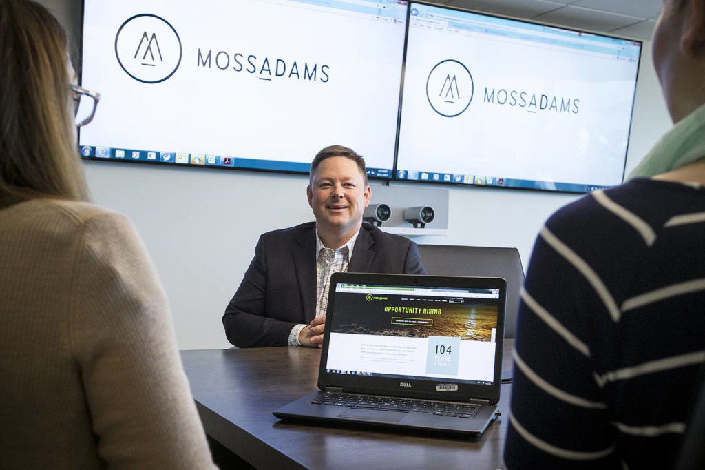 Along with a remodel of its Everett office, Moss Adams also launched new branding and a reworked website in June. (Ian Terry / The Herald)
