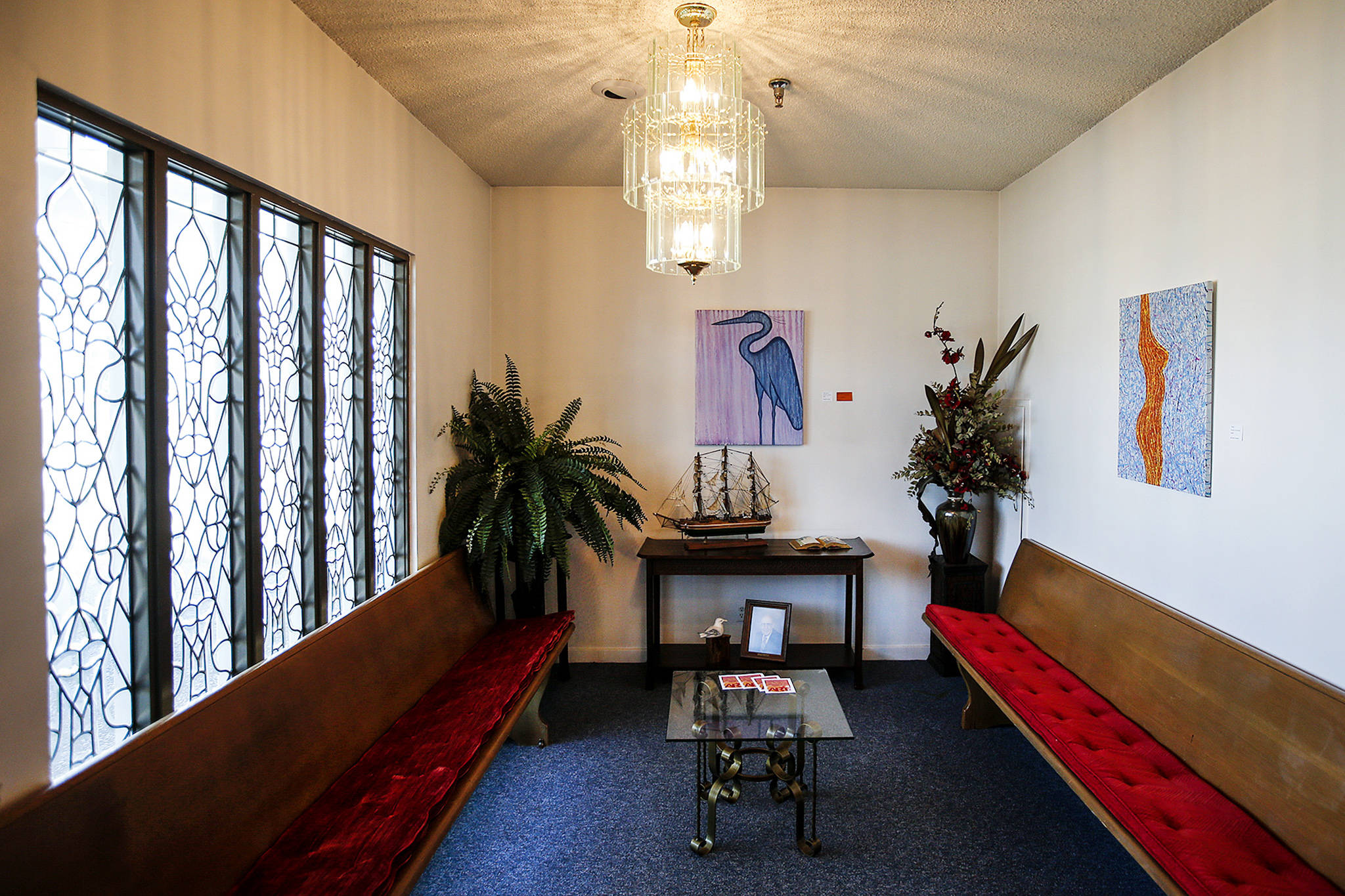 Local artwork adorns the walls of Solie Funeral Home in Everett. (Ian Terry / The Herald)