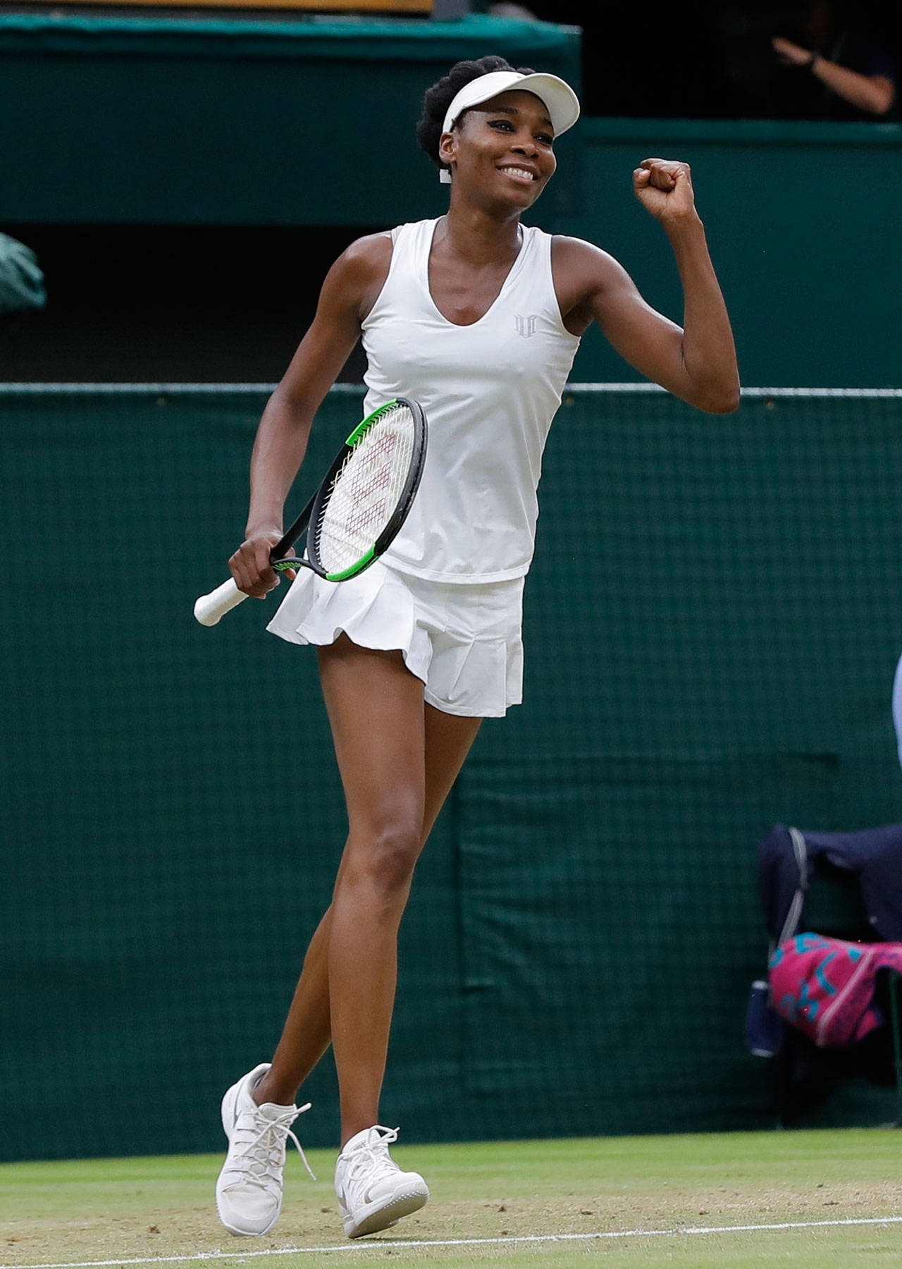Venus Williams of the United States celebrates after beating Latvia’s Jelena Ostapenko in a women’s singles match Tuesday at the Wimbledon Tennis Championships in London. (AP Photo/Alastair Grant)