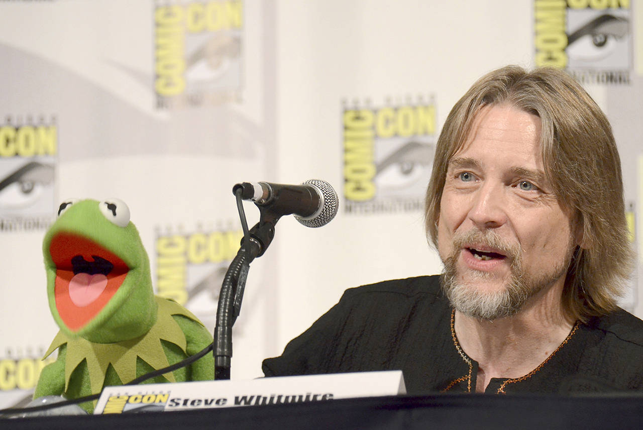 In this 2015 photo, Kermit the Frog (left) and puppeteer Steve Whitmire attend “The Muppets” panel on day 3 of Comic-Con International in San Diego. (Photo by Tonya Wise/Invision/AP, File)