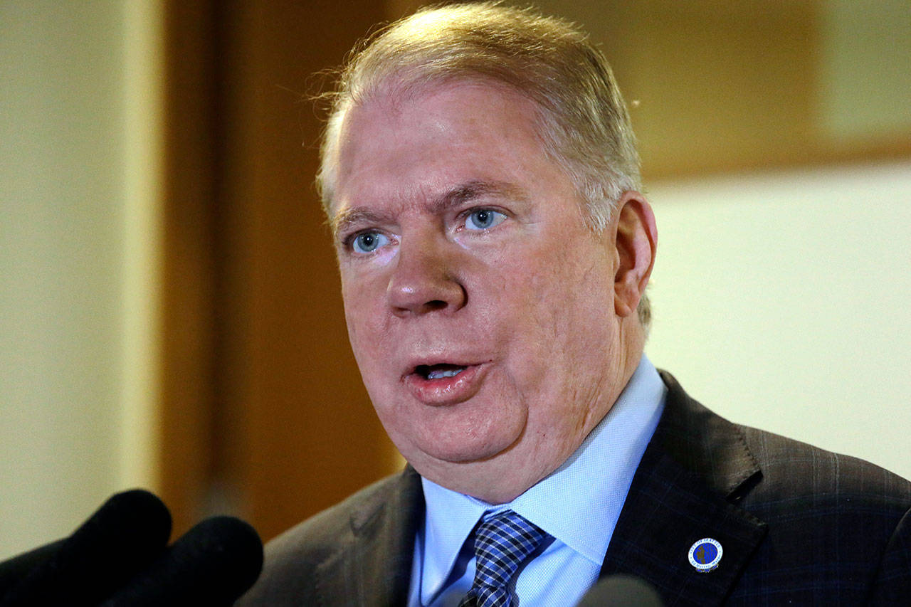 In this April 7 photo, Seattle Mayor Ed Murray reads a statement to media members in Seattle after a lawsuit was filed that accused Murray of sexually molesting a teenage high-school dropout in the 1980s. (AP Photo/Elaine Thompson, File)