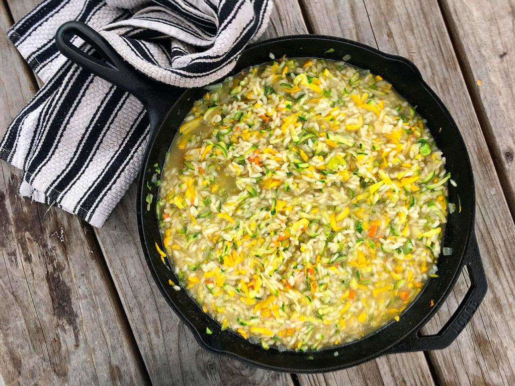 Zucchini risotto with squash flowers is the best creamy Italian rice dish the author’s husband has ever tasted. (Erin Pride-Swaney / For The Herald)
