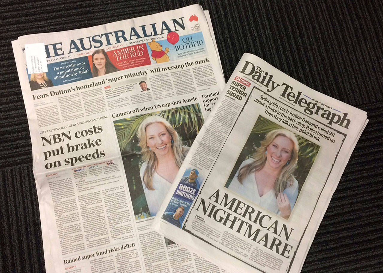 Front pages of two Australian newspapers on Tuesday feature photos and story of the shooting death of Australia’s Justine Damond. (AP Photo/Kristen Gelineau)