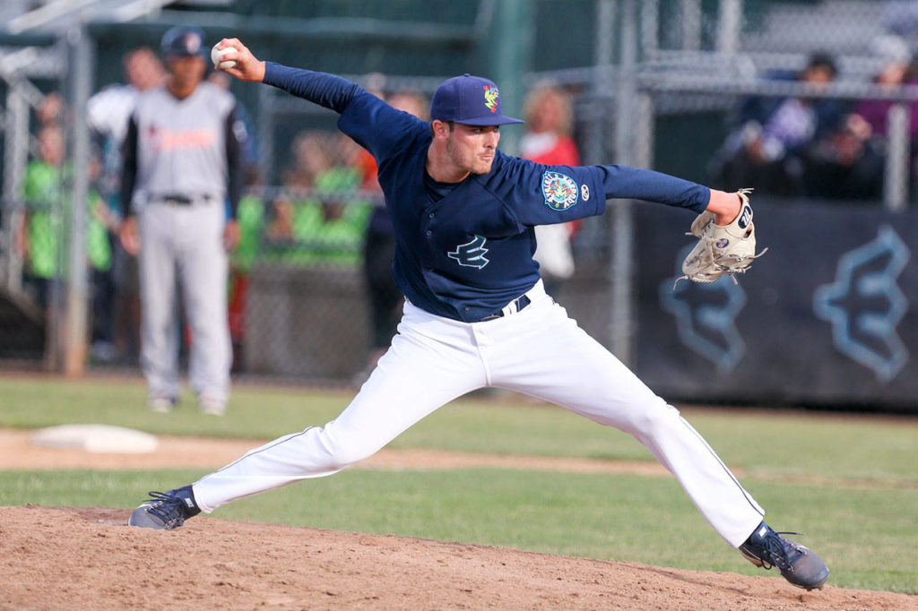 Wyatt Mills throws a pitch for the AquaSox during a game against Salem-Keizer on July 9, 2017, at Everett Memorial Stadium in Everett. (Kevin Clark / The Herald)
