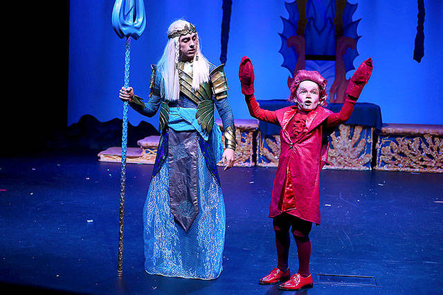 Erik Ortiz as King Triton and Brandon Oke as Sebastian star in the Ludus Performing Arts production of “The Little Mermaid,” through July 29 in the PUD theater in Everett.
