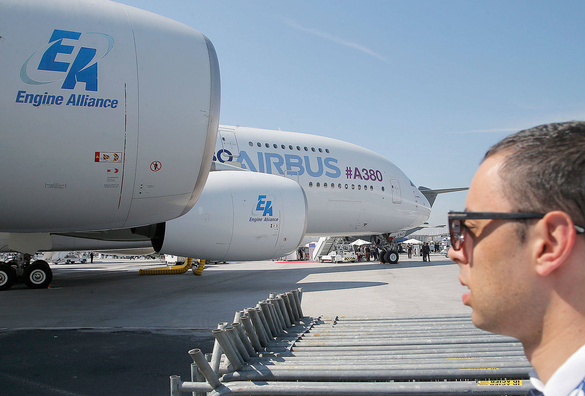 A man looks at an Airbus A380 at the Paris Air Show in France in June. (AP Photo/Michel Euler)