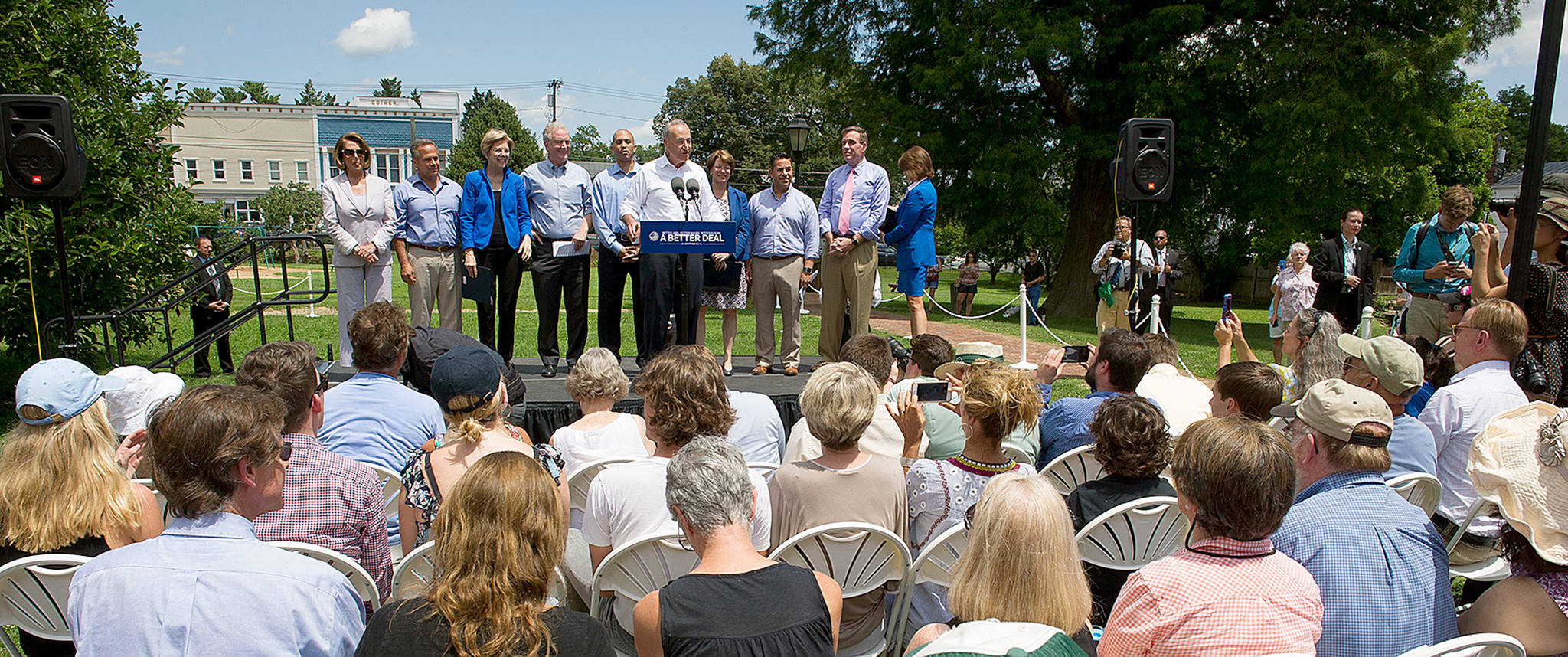 Senate Minority Leader Chuck Schumer of New York (at podium) is joined by other congressional Democrats in Berryville, Virginia, on Monday to unveil the party’s new agenda. (AP Photo/Cliff Owen)