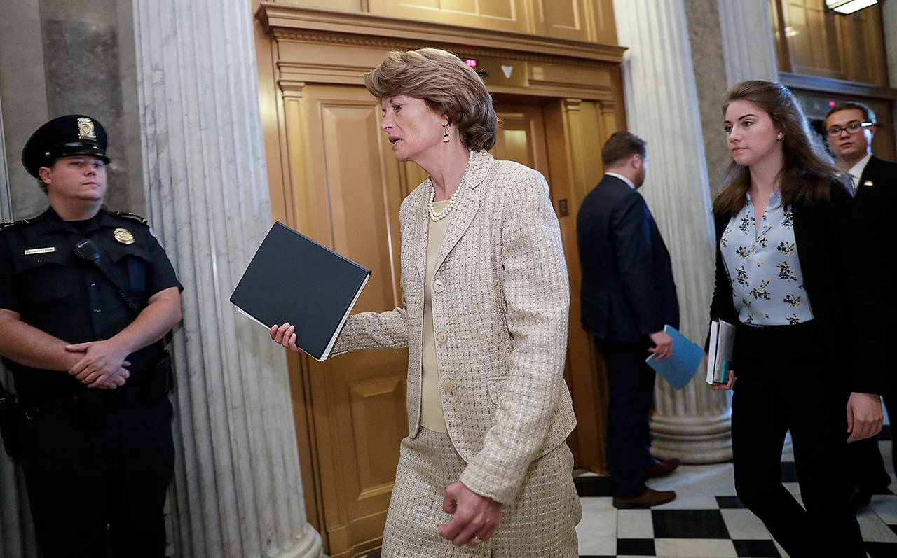 Sen. Lisa Murkowski, R-Alaska, arrives for a vote at the Capitol in Washington on Wednesday. (AP Photo/J. Scott Applewhite)