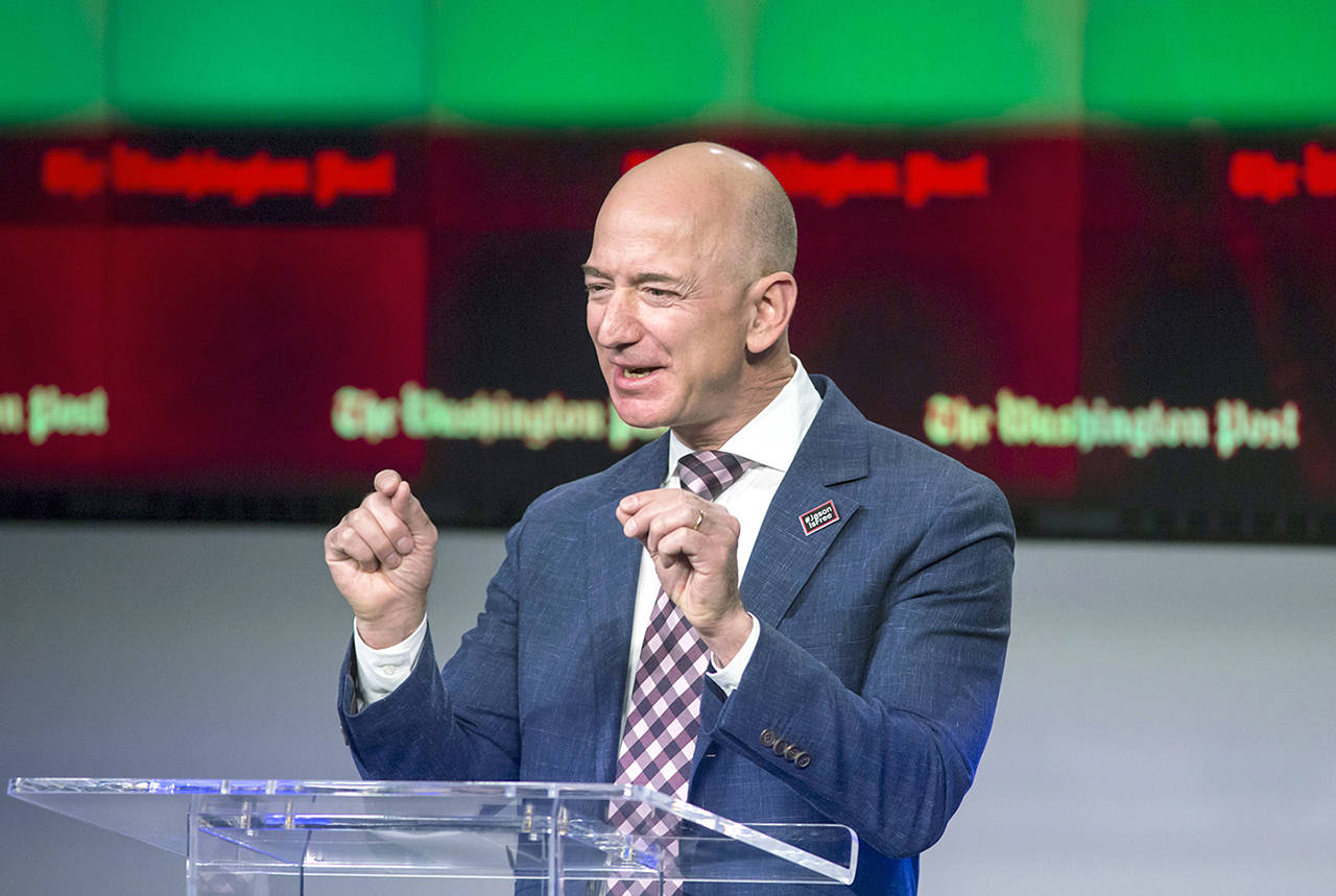 In this 2016 photo, billionaire Amazon founder and Washington Post owner Jeff Bezos talks about the history and character of the Post during a dedication ceremony for its new headquarters in Washington. (AP Photo/J. Scott Applewhite, File)