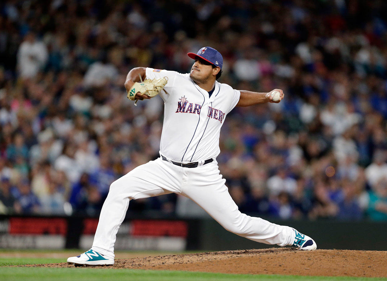 Mariners relief pitcher James Pazos works against the Royals during a game July 3, 2017, in Seattle. (AP Photo/John Froschauer)