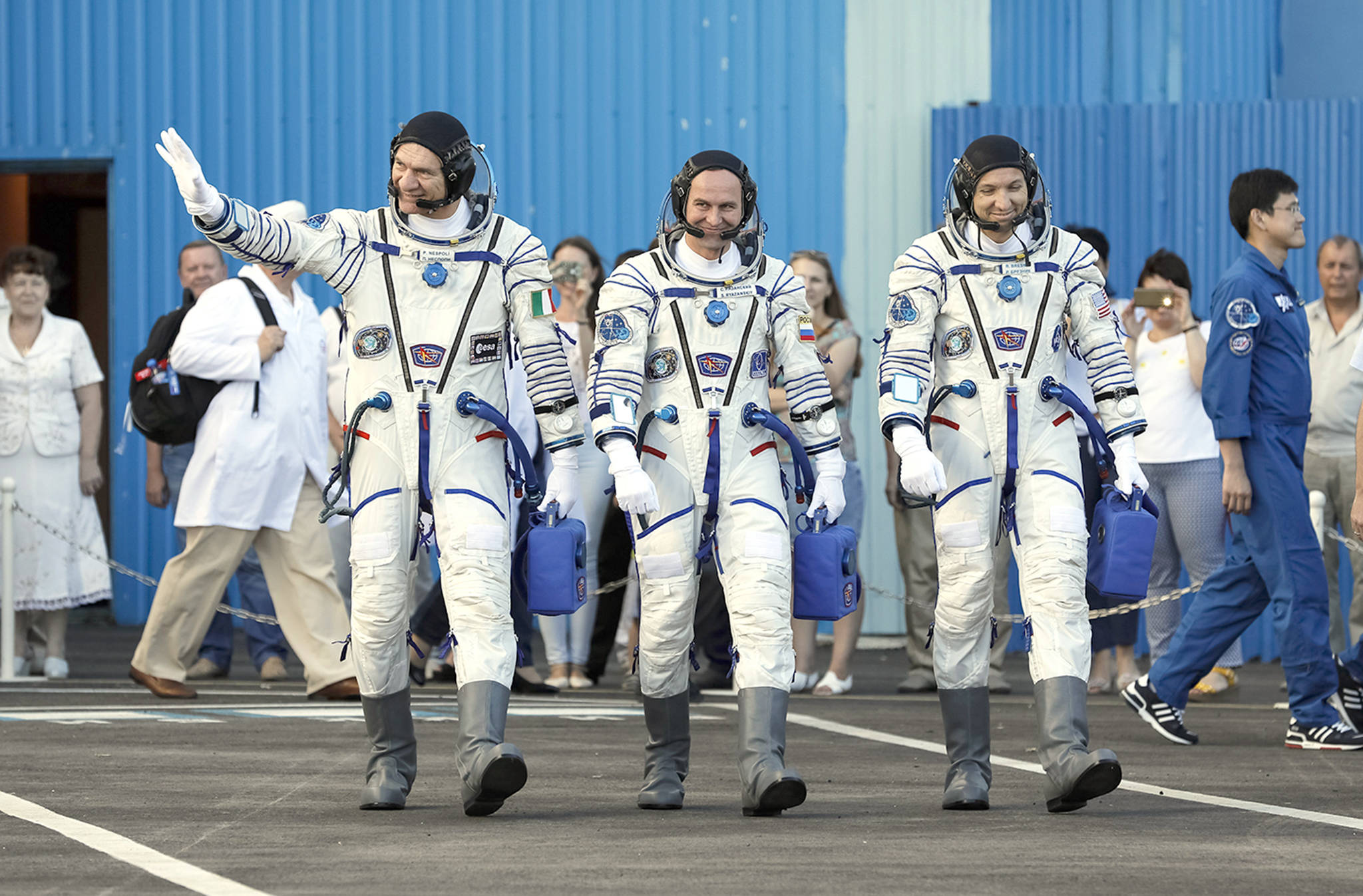 U.S. astronaut Randy Bresnik (right), Russian cosmonaut Sergey Ryazanskiy (center) and Italian astronaut Paolo Nespoli, members of the main crew of the expedition to the International Space Station (ISS), walk prior the launch of Soyuz MS-05 space ship at the Russian leased Baikonur cosmodrome, Kazakhstan, on Friday. (AP Photo/Shamil Zhumatov, Pool)