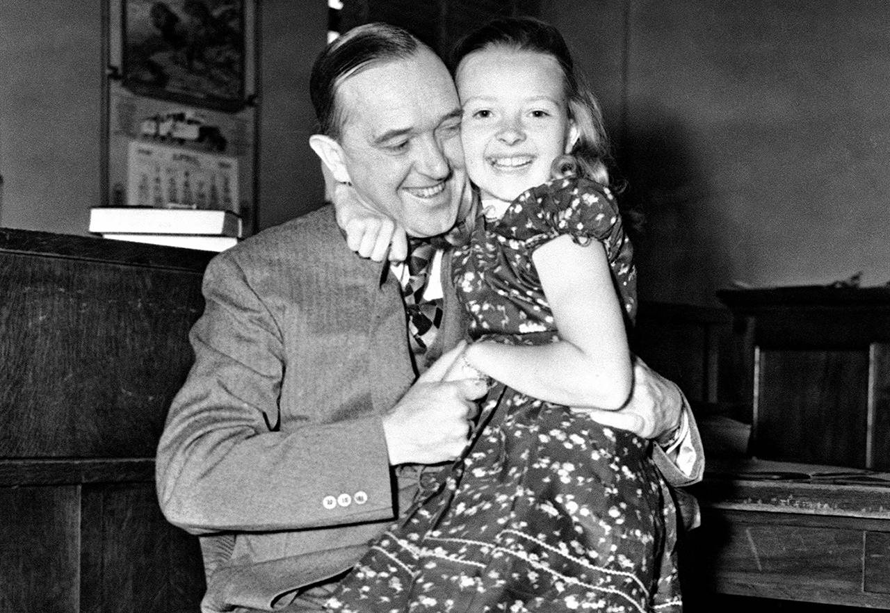 In this April 1938 photo, actor Stan Laurel hugs his daughter Lois in Los Angeles. (AP Photo, File)