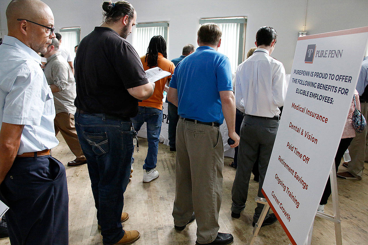 Applicants line up to talk to recruiters at a medical marijuana job fair in McKeesport, Pennsylvania, on Thursday. (AP Photo/Gene Puskar)