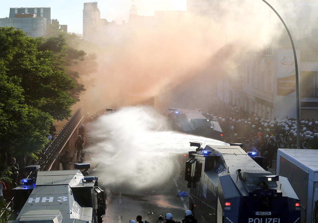 Police uses water canons during a protest against the G-20 summit in Hamburg, northern Germany on Thursday. The leaders of the group of 20 meet July 7 and 8. (AP Photo/Michael Probst)
