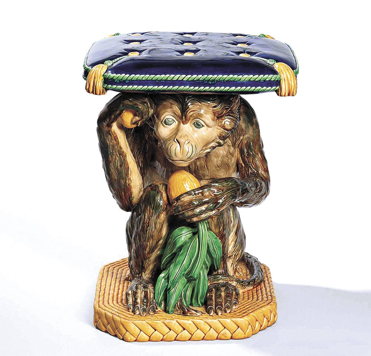 This majolica monkey crouching under a pillow must be a seat inside the home of the lucky bidder who bought it for $13,530 at a recent Boston auction. The seat is 18 inches high, the comfortable height for a chair. It is marked “Mintons,” proving it is old. (Cowles Syndicate Inc.)