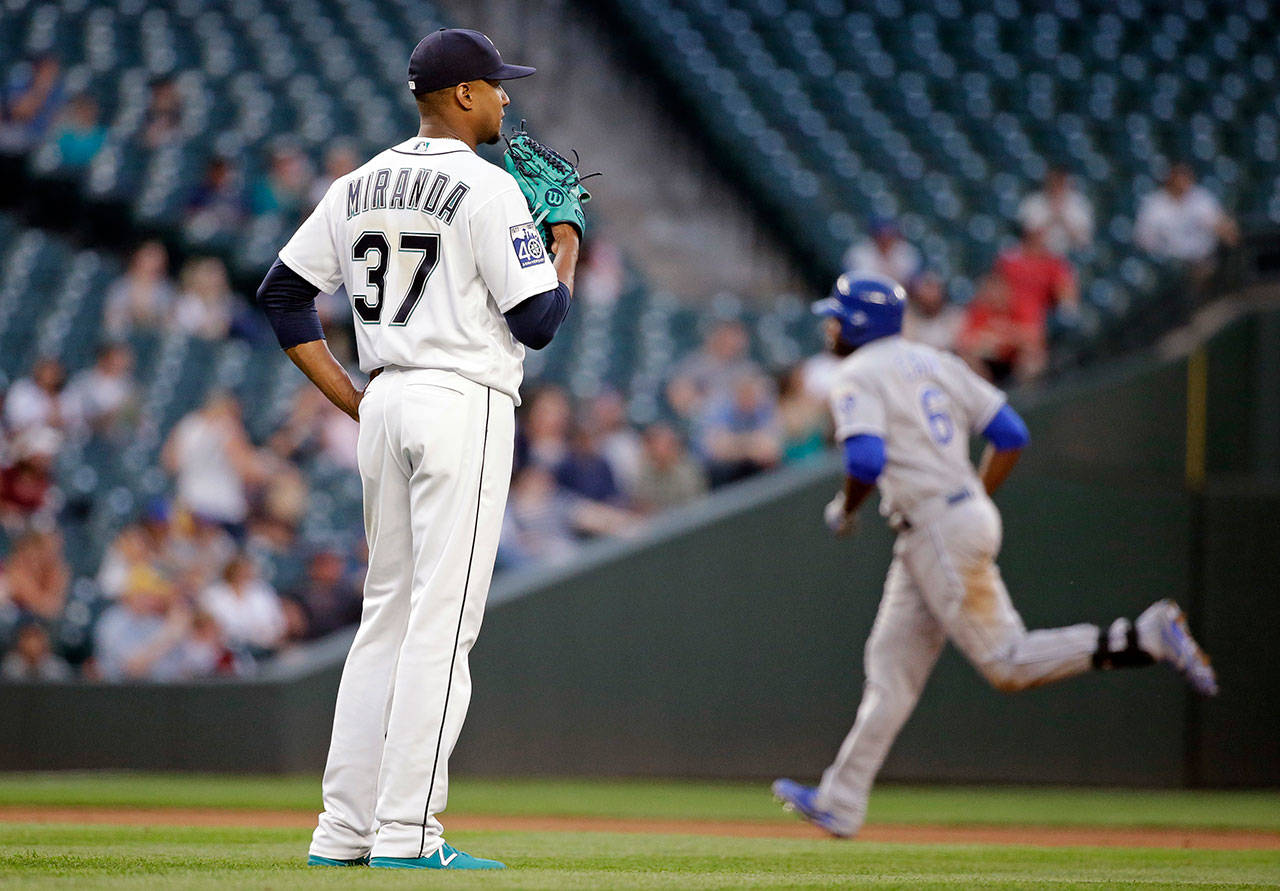 Mariners starting pitcher Ariel Miranda (37) waits as the Royals’ Lorenzo Cain rounds the bases on a two-run home run during the fifth inning of a game July 5, 2017, in Seattle. (AP Photo/Elaine Thompson)