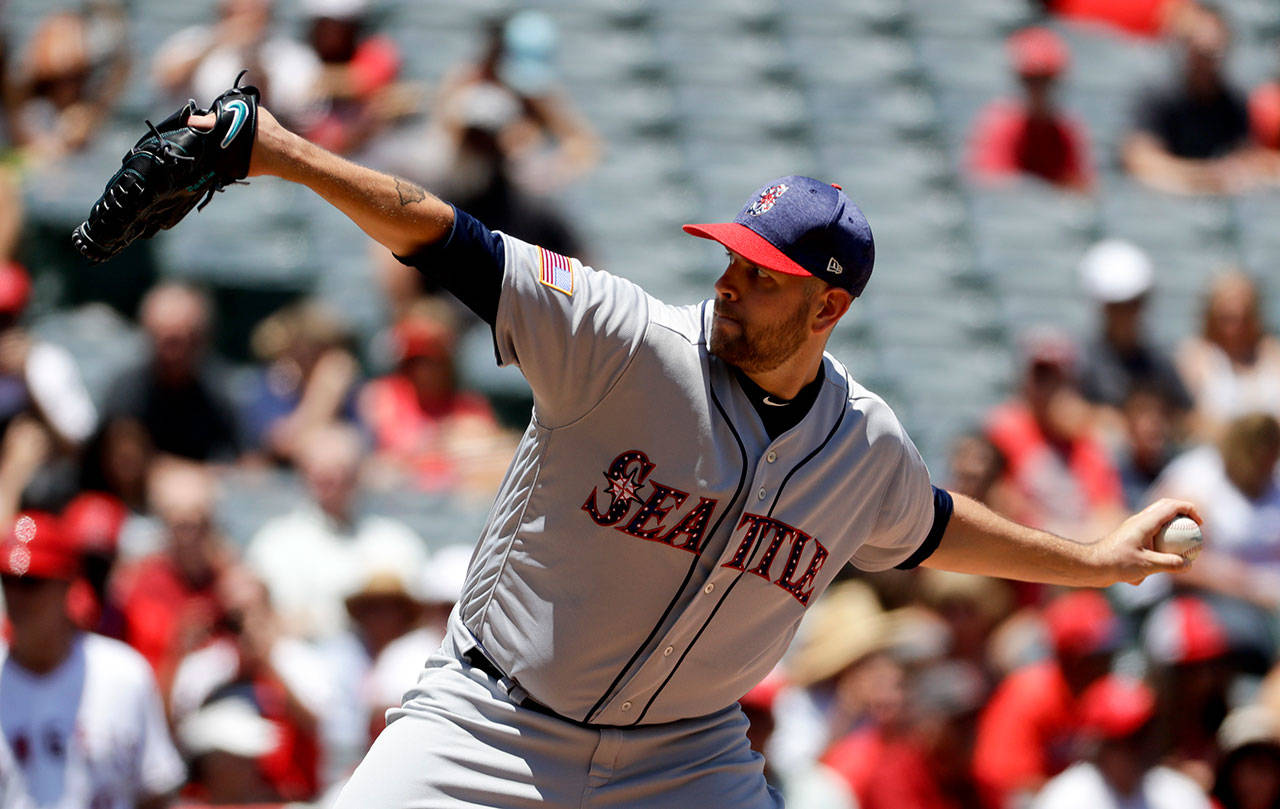 Seattle Mariners starting pitcher James Paxton throws against the Los Angeles Angels during the first inning in Anaheim, Calif., Sunday, July 2. (AP Photo/Chris Carlson)