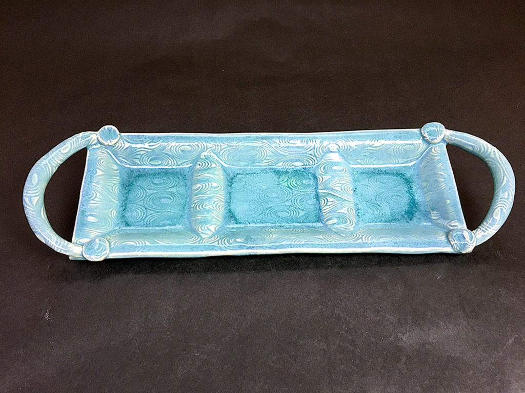 Melinda O’Malley’s “Snack Tray” is displayed in July at Gallery North in Edmonds.
