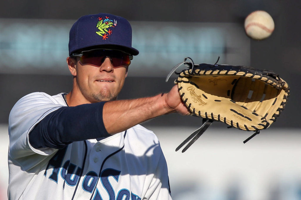 AquaSox first baseman Evan White plays catch before a game against Canadians on June 27, 2017, at Everett Memorial Stadium in Everett. (Kevin Clark / The Herald)
